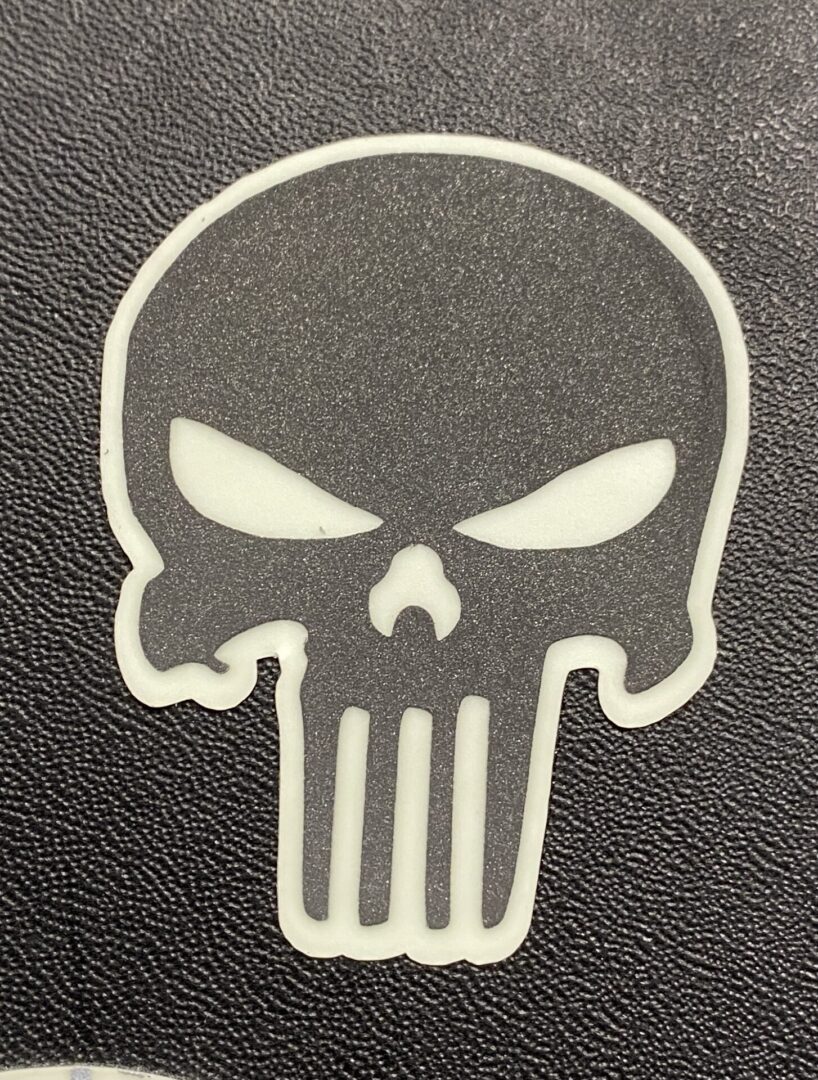 a sticker of the punisher logo